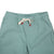 General front detail shot of Topo Designs Women's Dirt Pants in Sage green showing drawstring waist.