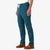 Topo Designs Men's Dirt Pants in "pond blue" on model side.