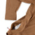 General shot of side zipper pockets on the Topo Designs Men's Global Shirt long sleeve lightweight travel snap shirt in dark khaki brown.