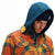 Front model shot of Topo Designs men's mountain organic cotton flannel shirt in "brick / mustard plaid" orange