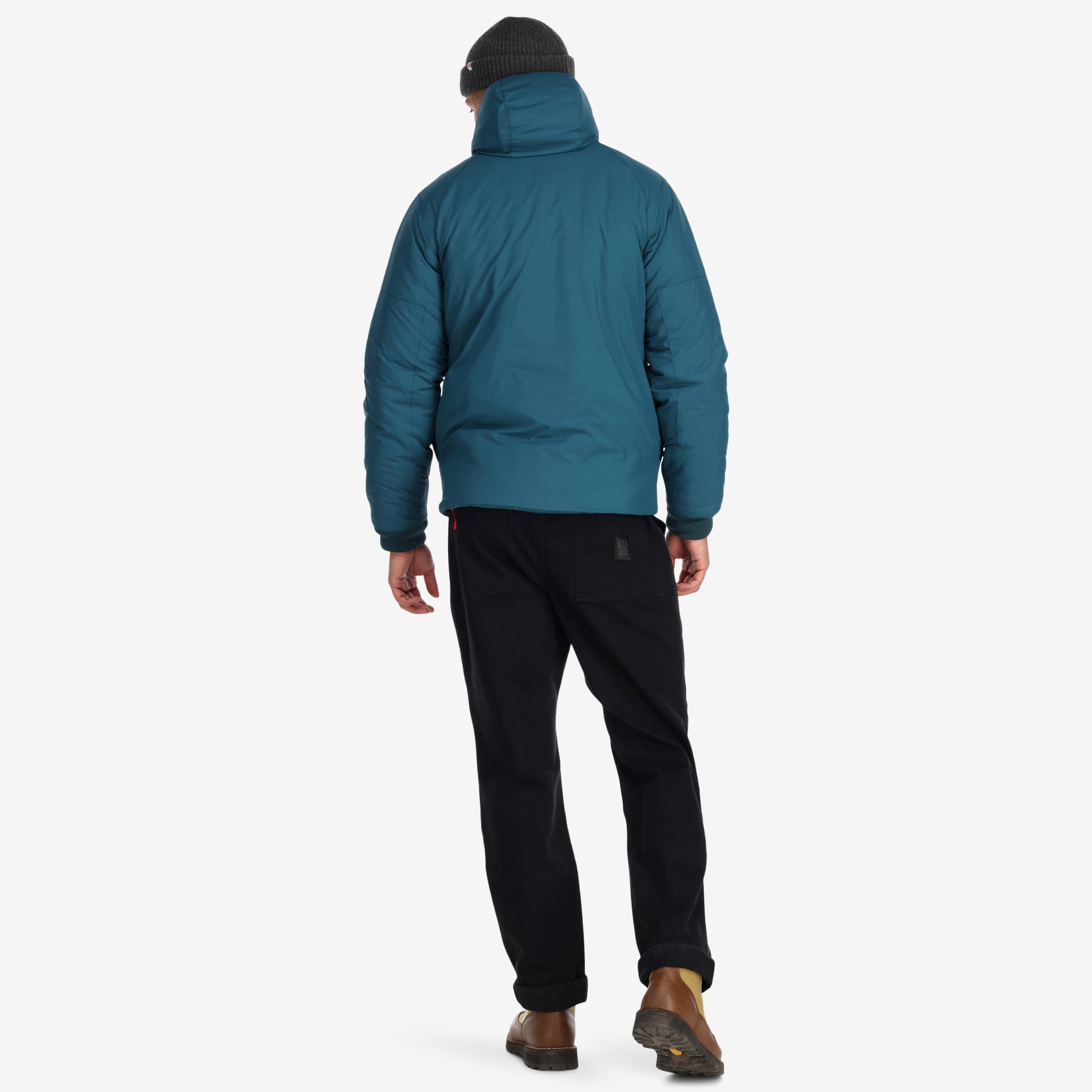 Back model shot of Topo Designs Mountain Puffer Primaloft insulated Hoodie jacket in "Pond Blue". Show on "Black" and "Forest"