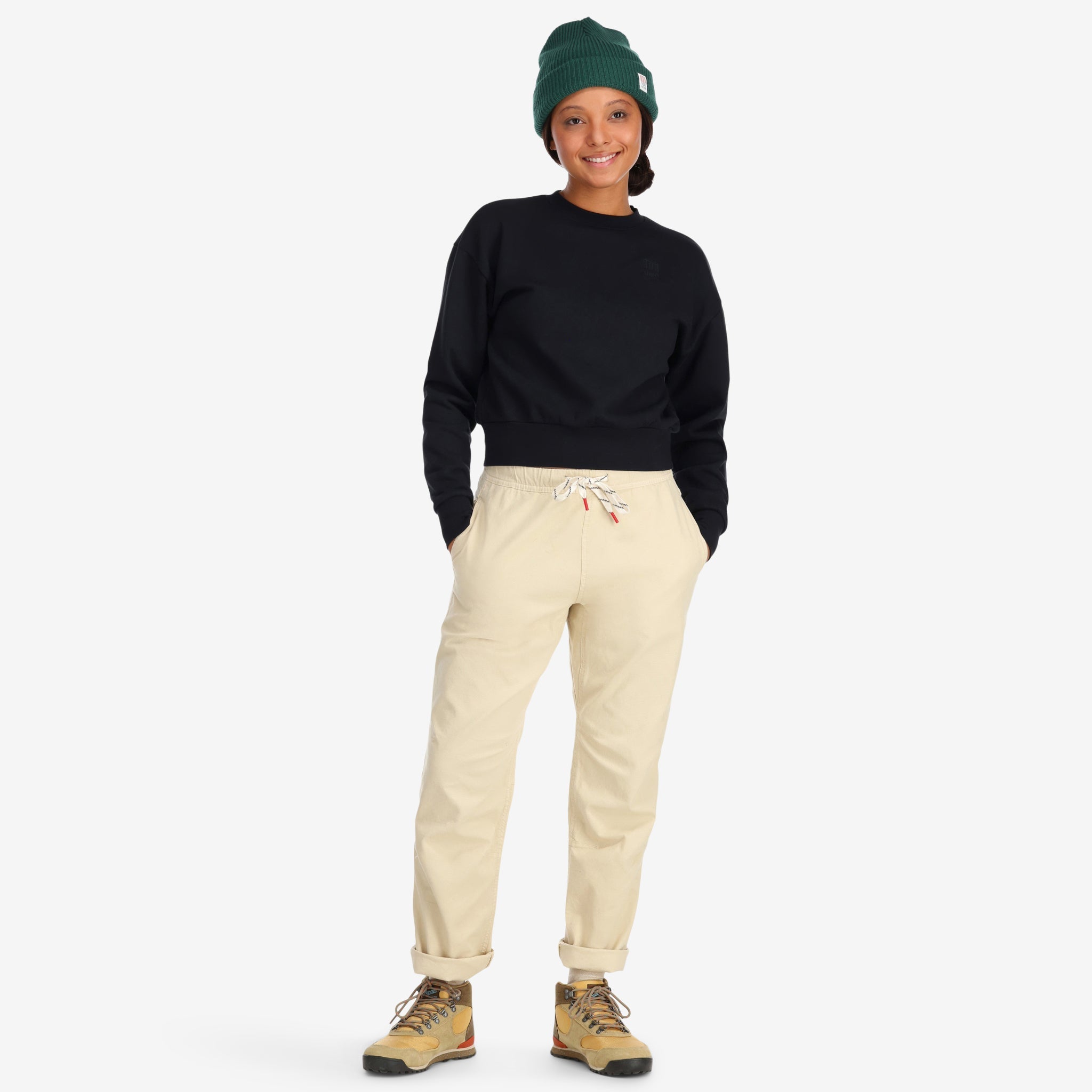 Front model shot of Topo Designs Women's Dirt Pants in 100% organic cotton with drawstring waist in "Sand" white. Show on "Peppercorn"