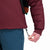 General front model shot of Topo Designs Women's Puffer Primaloft insulated Hoodie jacket in "burgundy" red showing bottom cinch cords. 