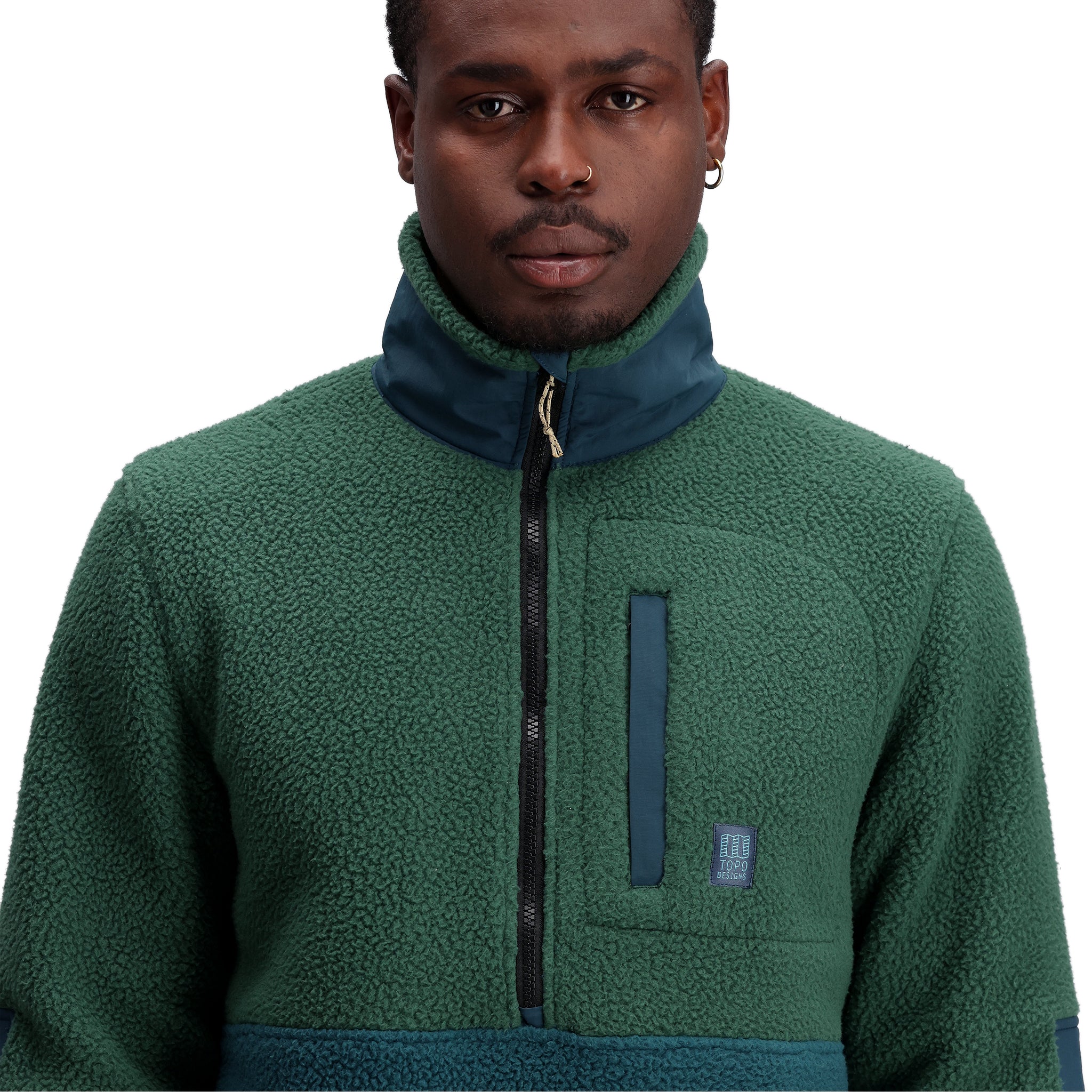 General shot of M Mountain Fleece Pullover in "Forest / Pond Blue"