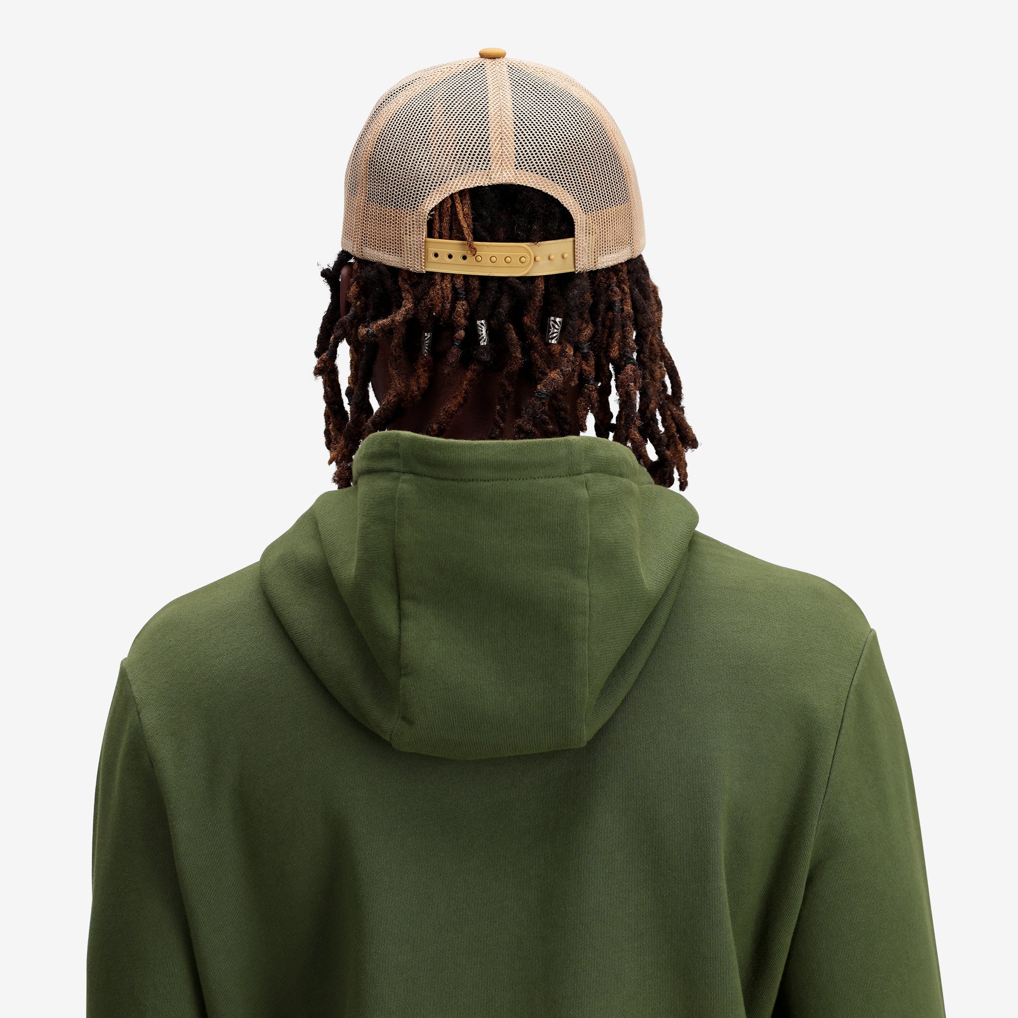 General shot Topo Designs Trucker Hat with mesh back and original logo patch in "Khaki".