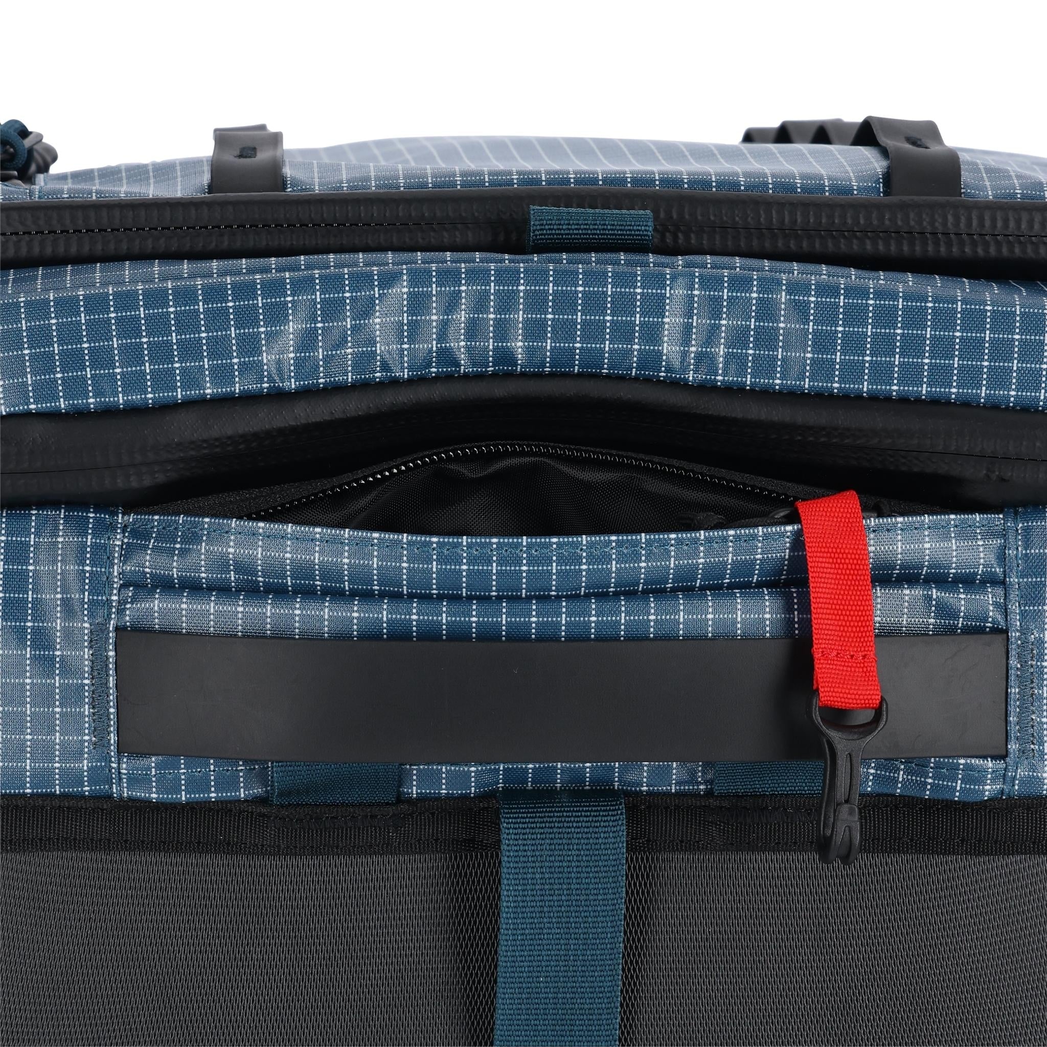 Detail shot of Topo Designs Apex Travel Roller Bag in "Pond Blue"