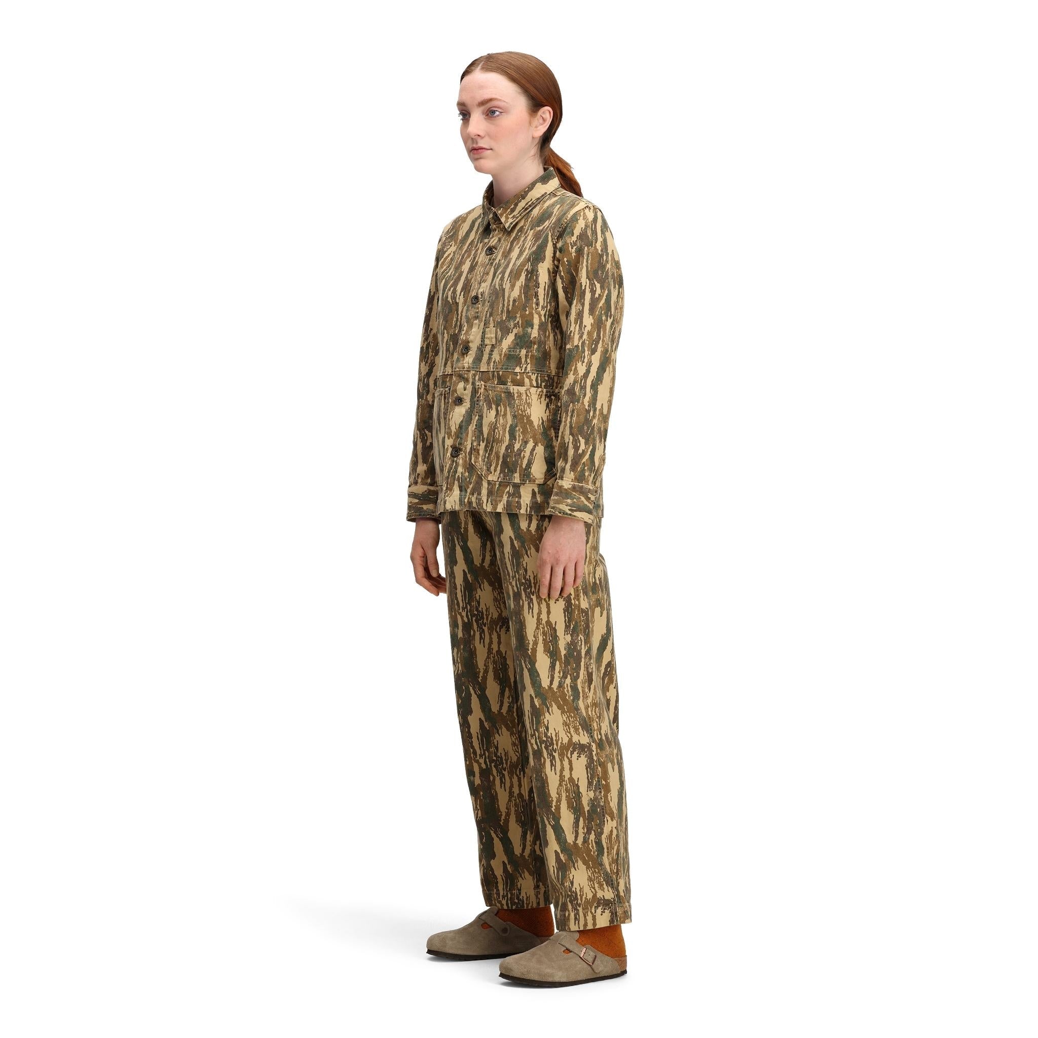 General side model shot of Topo Designs Dirt Utility Pants - Women's  in "Dirt Camo Print"