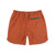 Back zipper pocket on Topo Designs Men's River quick-dry swim Shorts in "Brick" orange.