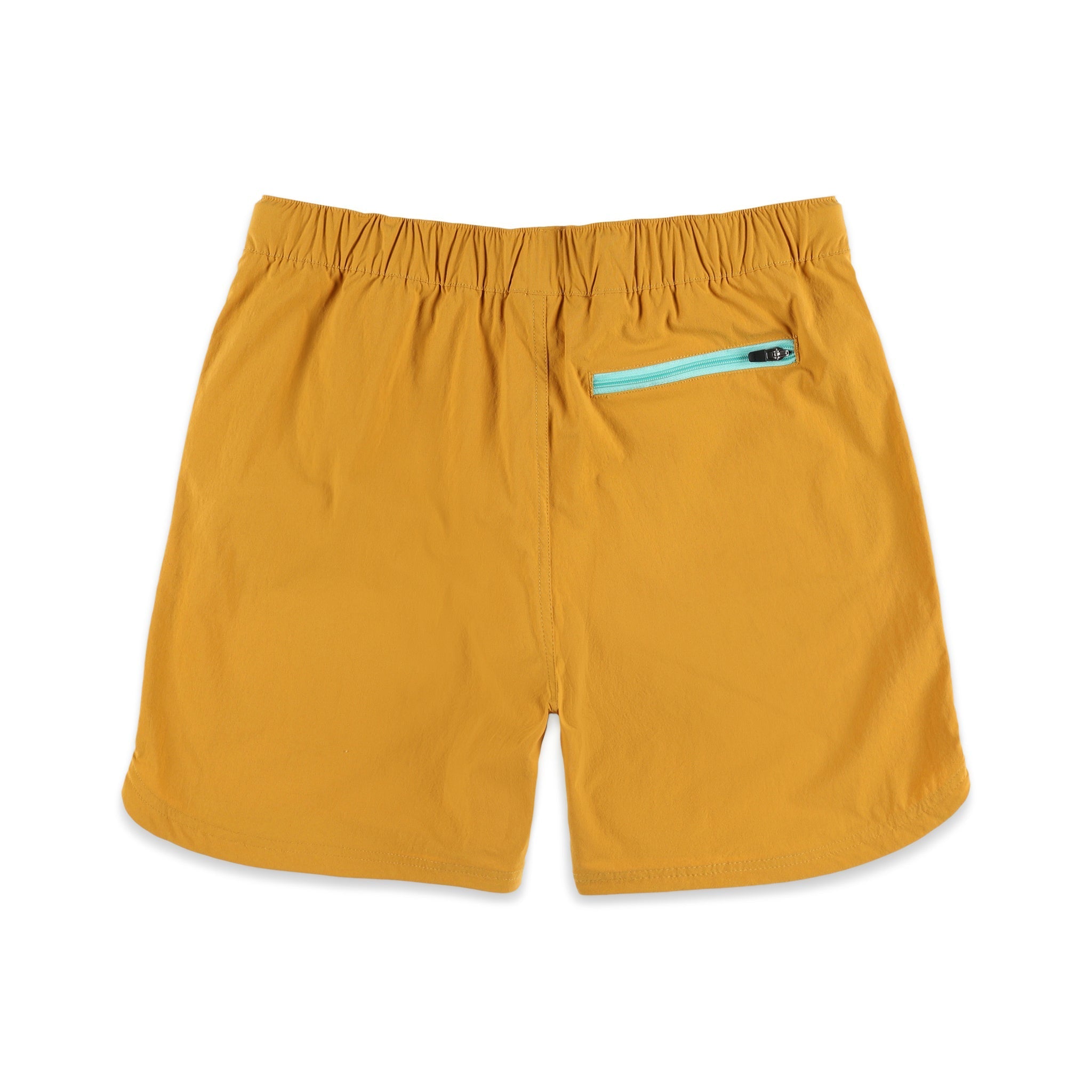 Back zipper pocket on Topo Designs Men's River quick-dry swim Shorts in mustard yellow.