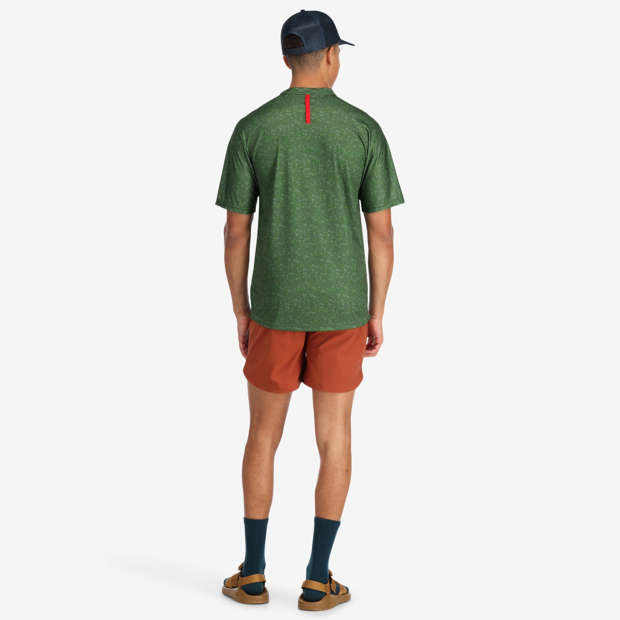 General back of Topo Designs Men's River quick-dry swim Shorts in "brick" orange on model.