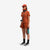 Front model shot of Topo Designs Women's Global Shirt Short Sleeve 30+ UPF rated travel shirt in "brick" orange.