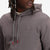 General detail shot of Topo Designs Men's Dirt Hoodie 100% organic cotton French terry sweatshirt in "charcoal" gray.