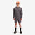 General shot front model shot of Topo Designs Men's Dirt Crew sweatshirt in 100% organic cotton in "charcoal" grey.