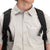 Close up model shot of Topo Designs Men's Global Shirt Short Sleeve 30+ UPF rated travel shirt in "Light Gray".