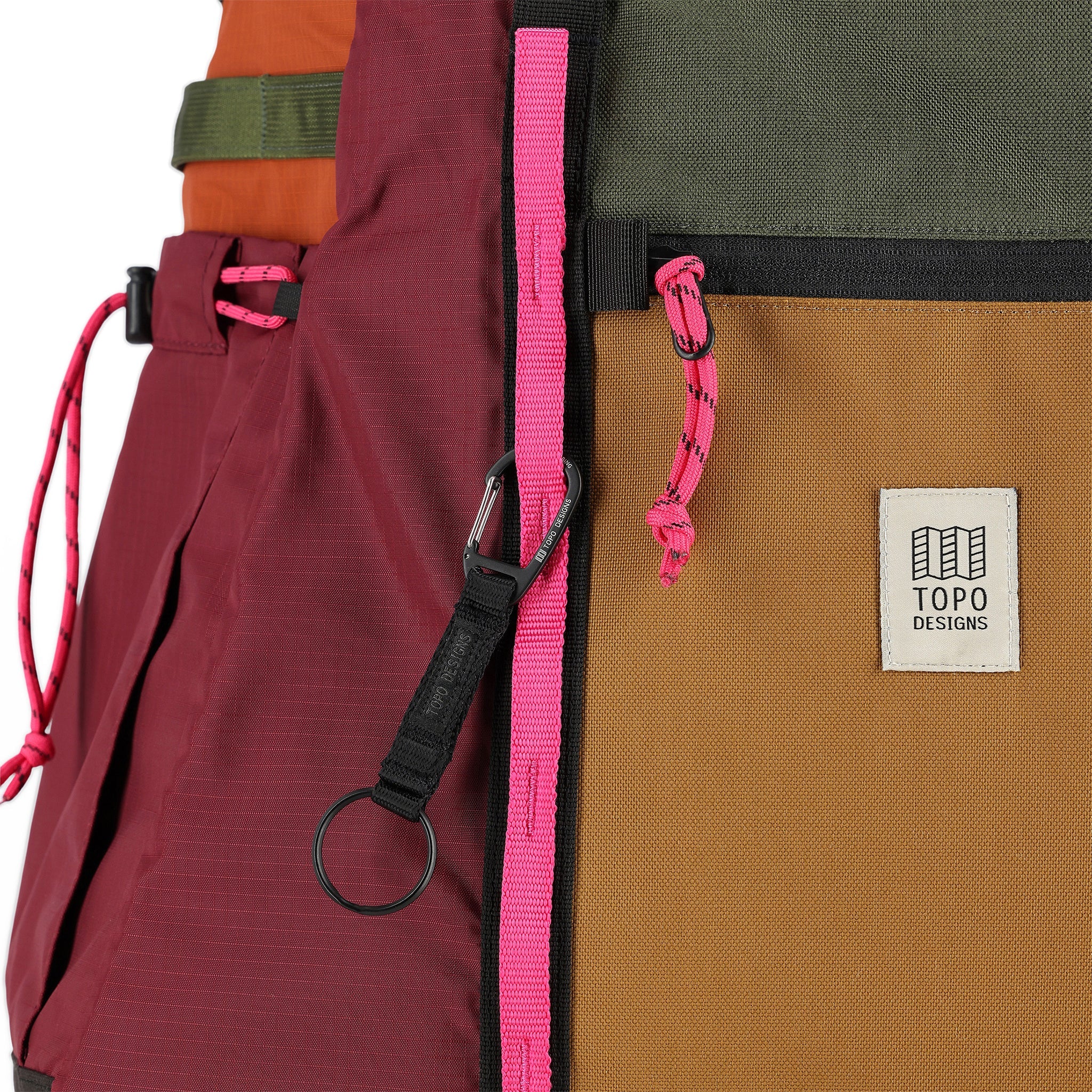 Close up front shot of Topo Designs Mountain Gear Bag tote hauler in lightweight recycled "Bdurgundy / Dark Khaki" nylon.