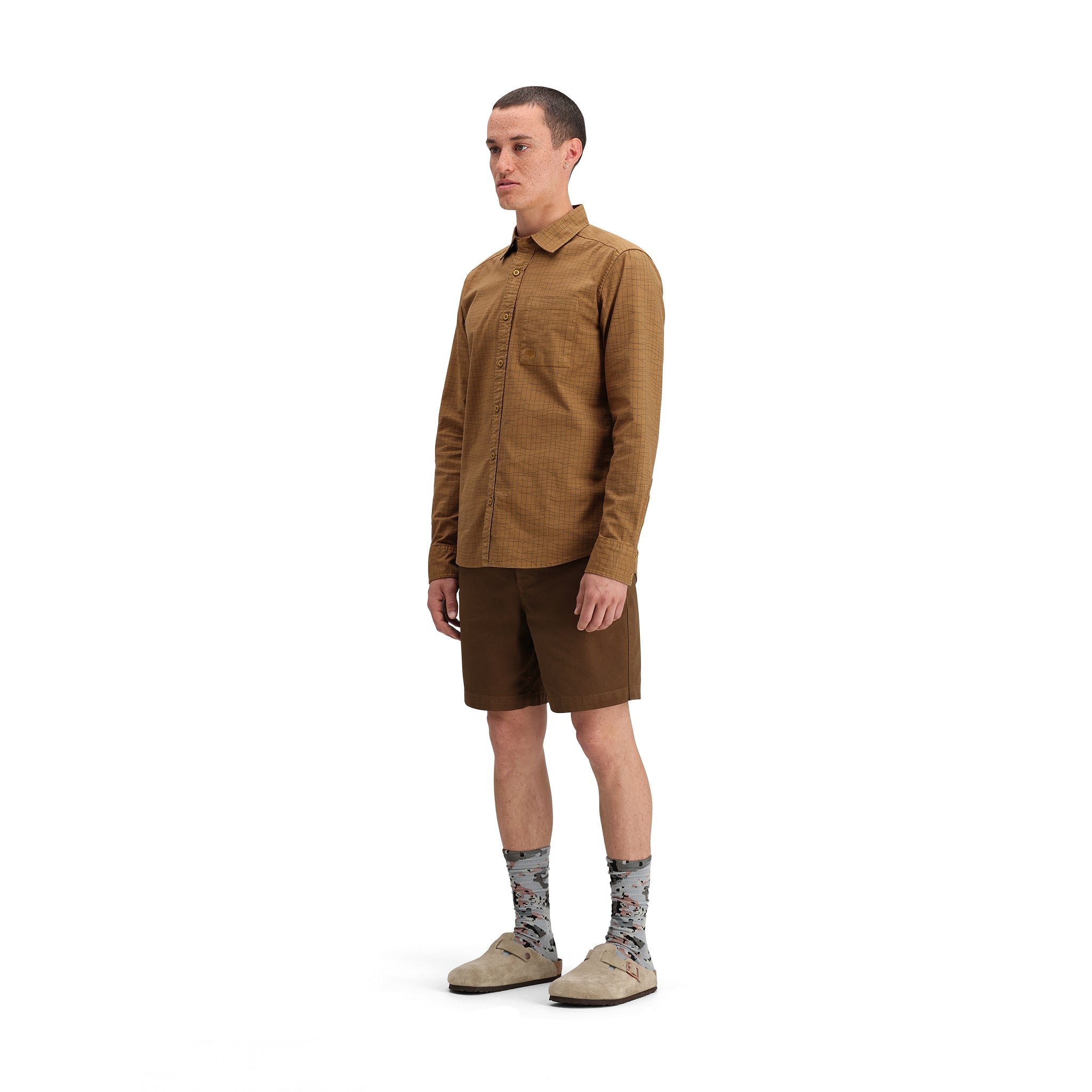 General side model shot of Topo Designs Dirt Desert Shirt - Men's  in "Dark Khaki Terrain"