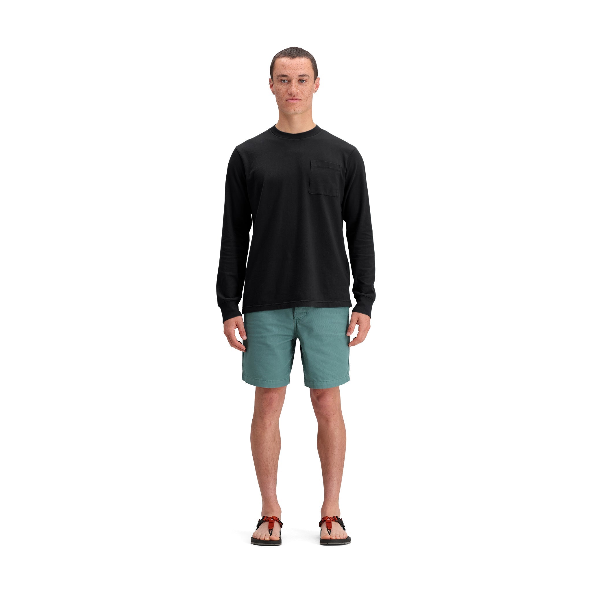 General front model shot of Topo Designs Dirt Shorts - Men's in "Sea Pine"