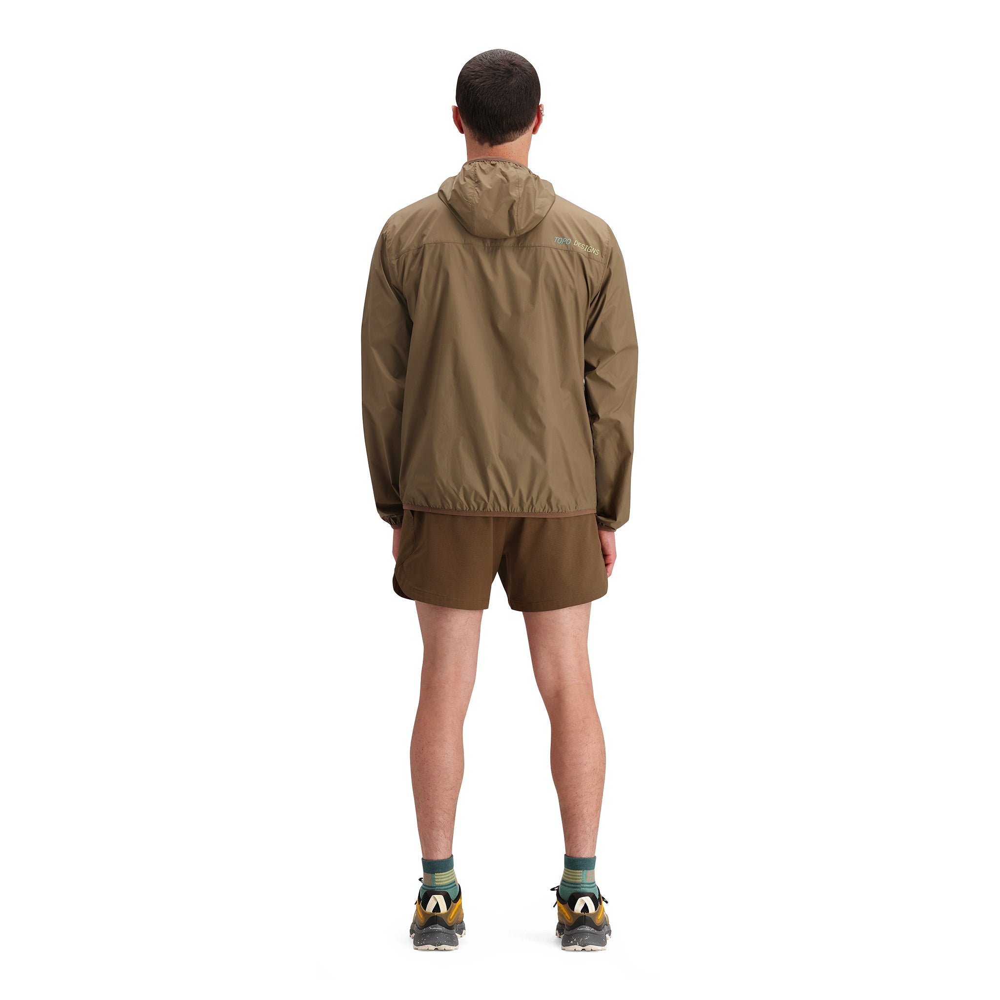 General back model shot of Topo Designs Global Trek Shorts 7" - Men's in "Desert Palm"