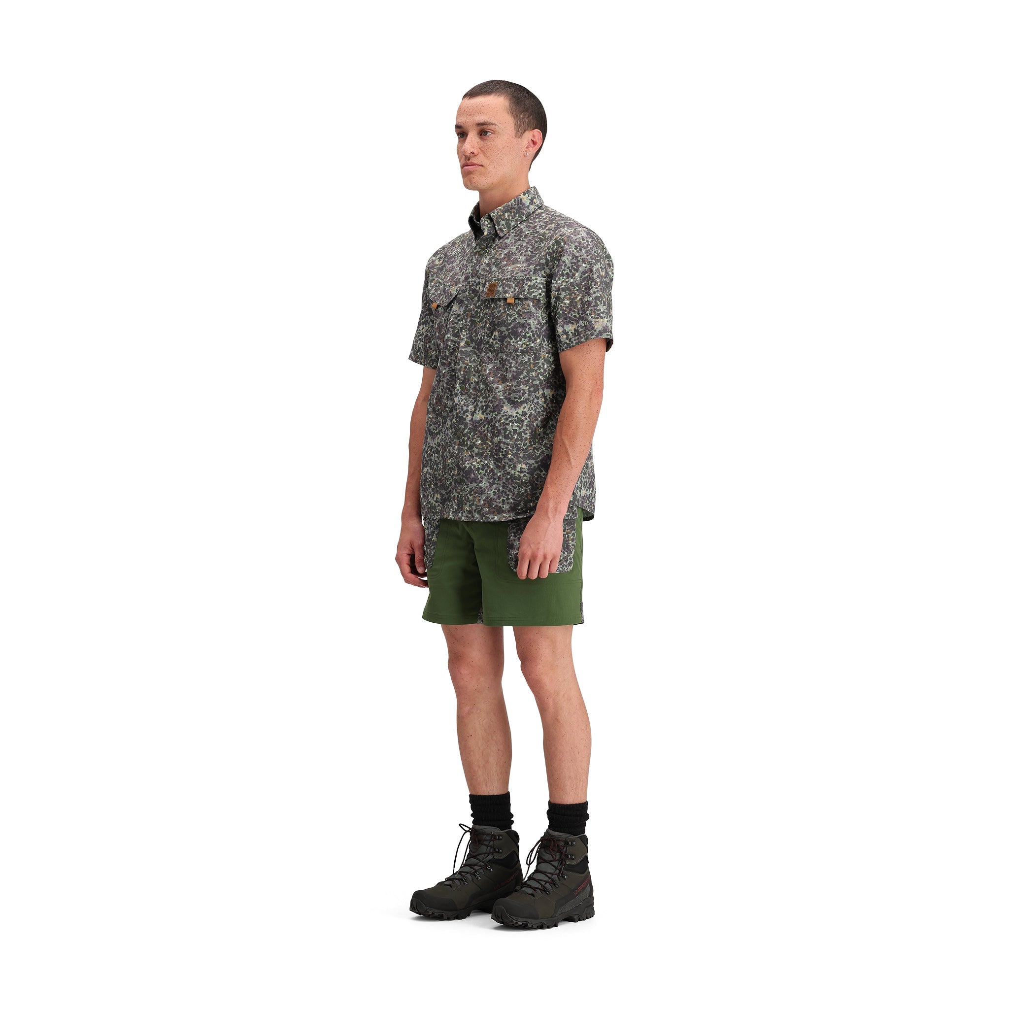 General side model shot of Topo Designs Retro River Shirt Ss - Men's in "Olive Meteor"