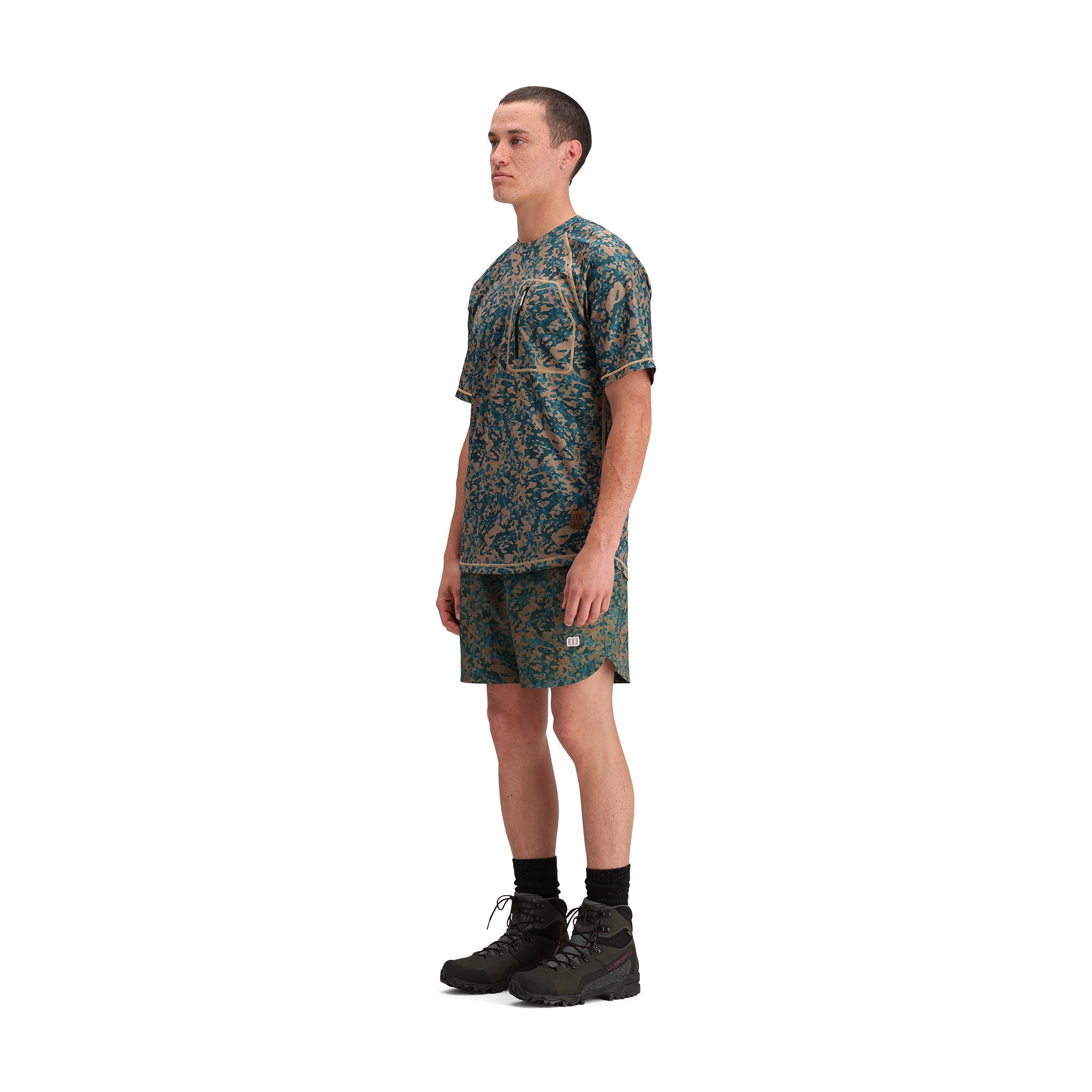 General side model shot of Topo Designs River Shorts - Men's in "Sahara Nebula"