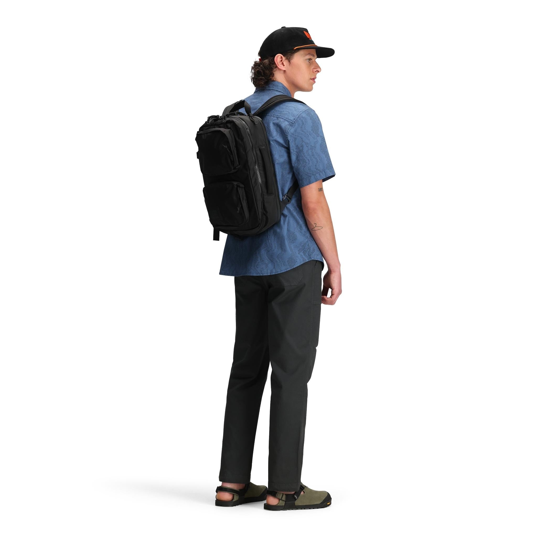 General back model shot of Topo Designs Dirt Desert Shirt Ss - Men's  in "Stone Blue River Bed"