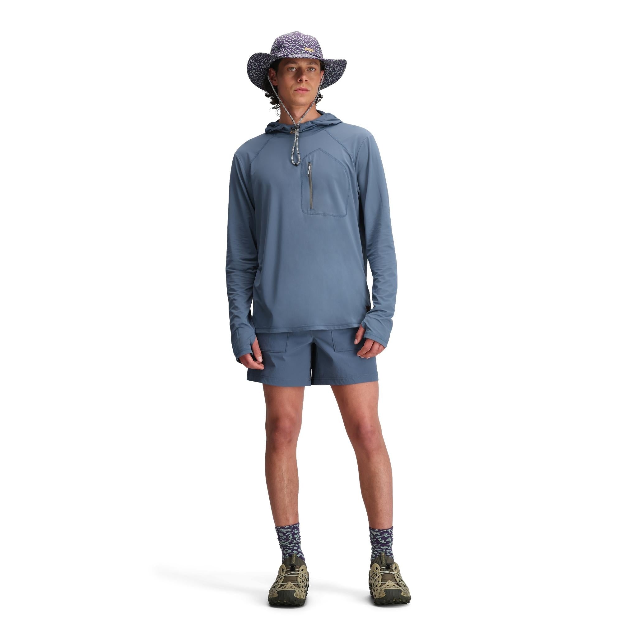 Model shot of Topo Designs Mesa Shorts - Men's in "Stone Blue"