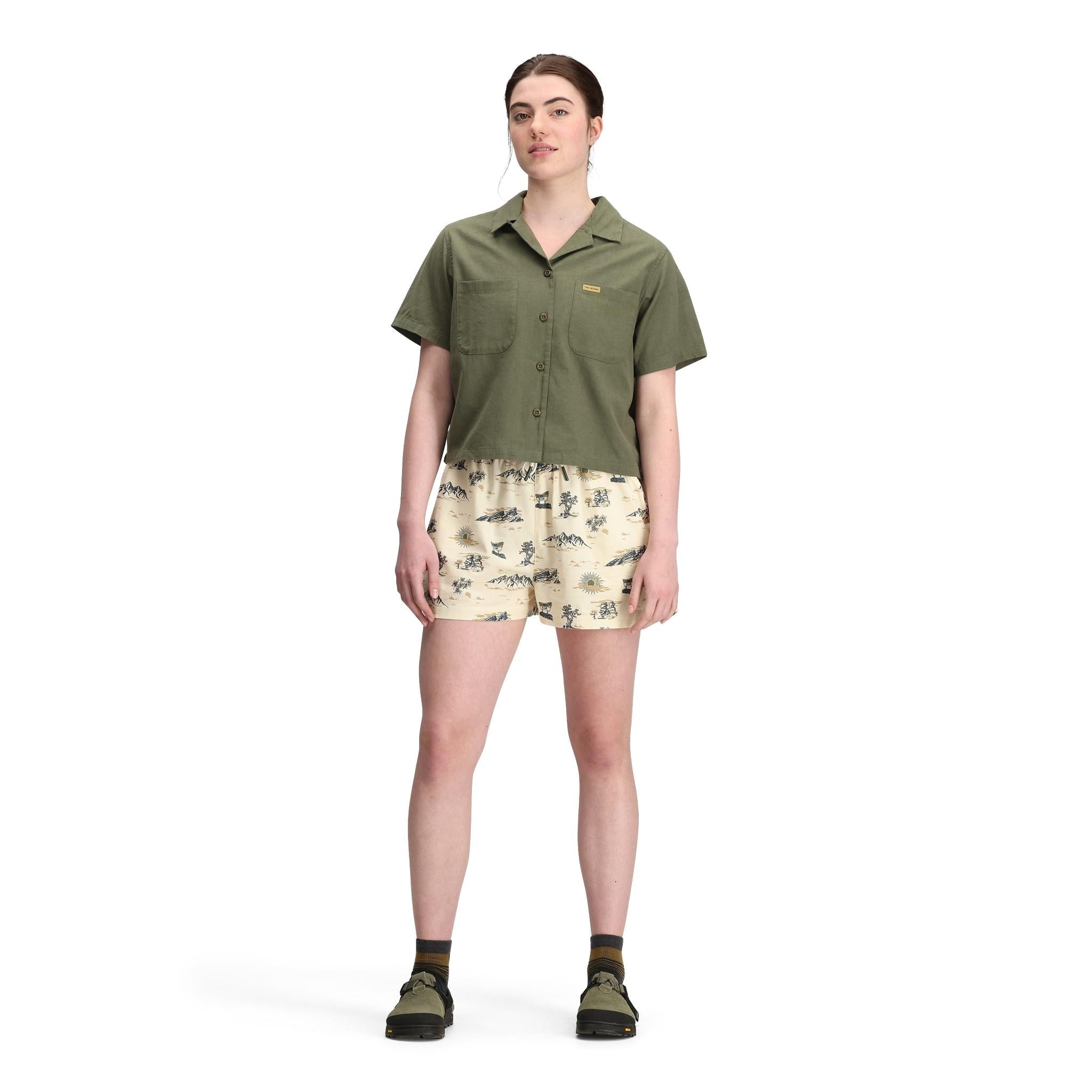 Front model shot of Topo Designs Daytripper Short Sleeve - Women's in "Beetle"