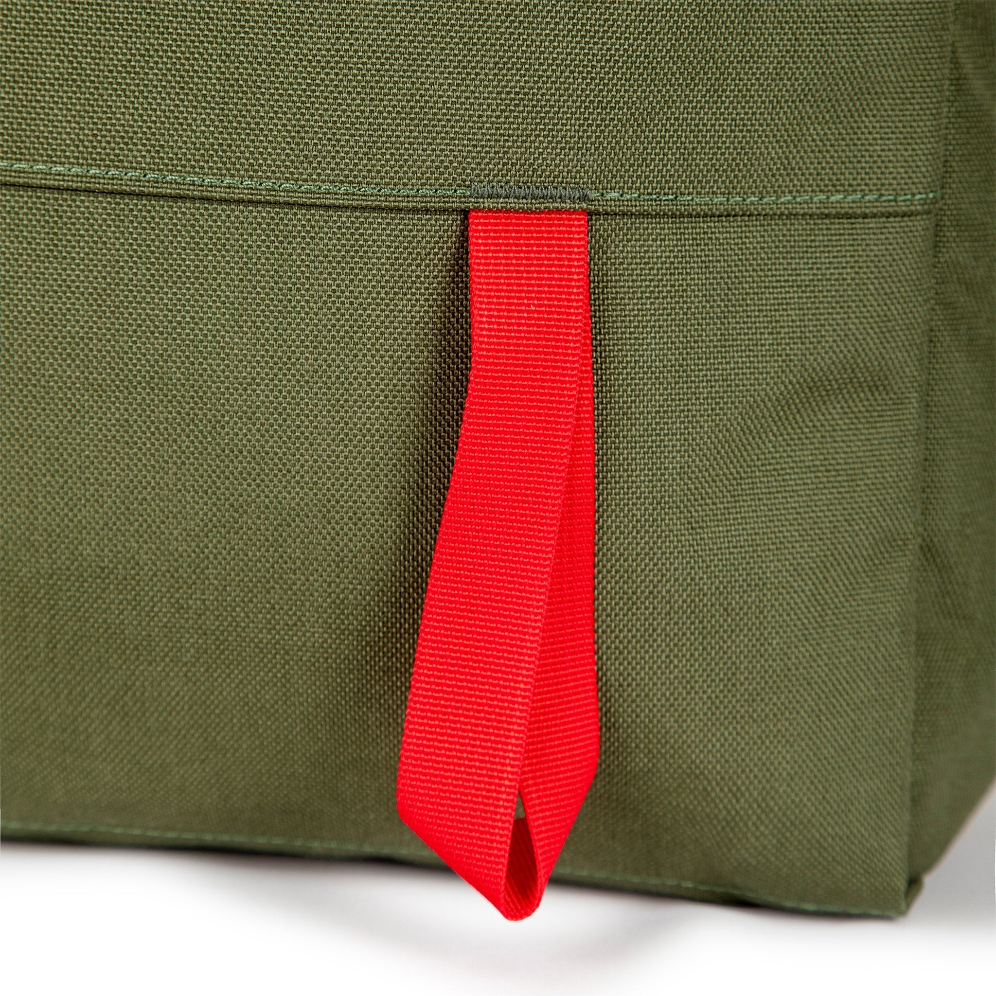 Ice axe loop on Topo Designs Daypack Classic 100% recycled nylon laptop backpack for work or school in Olive green.