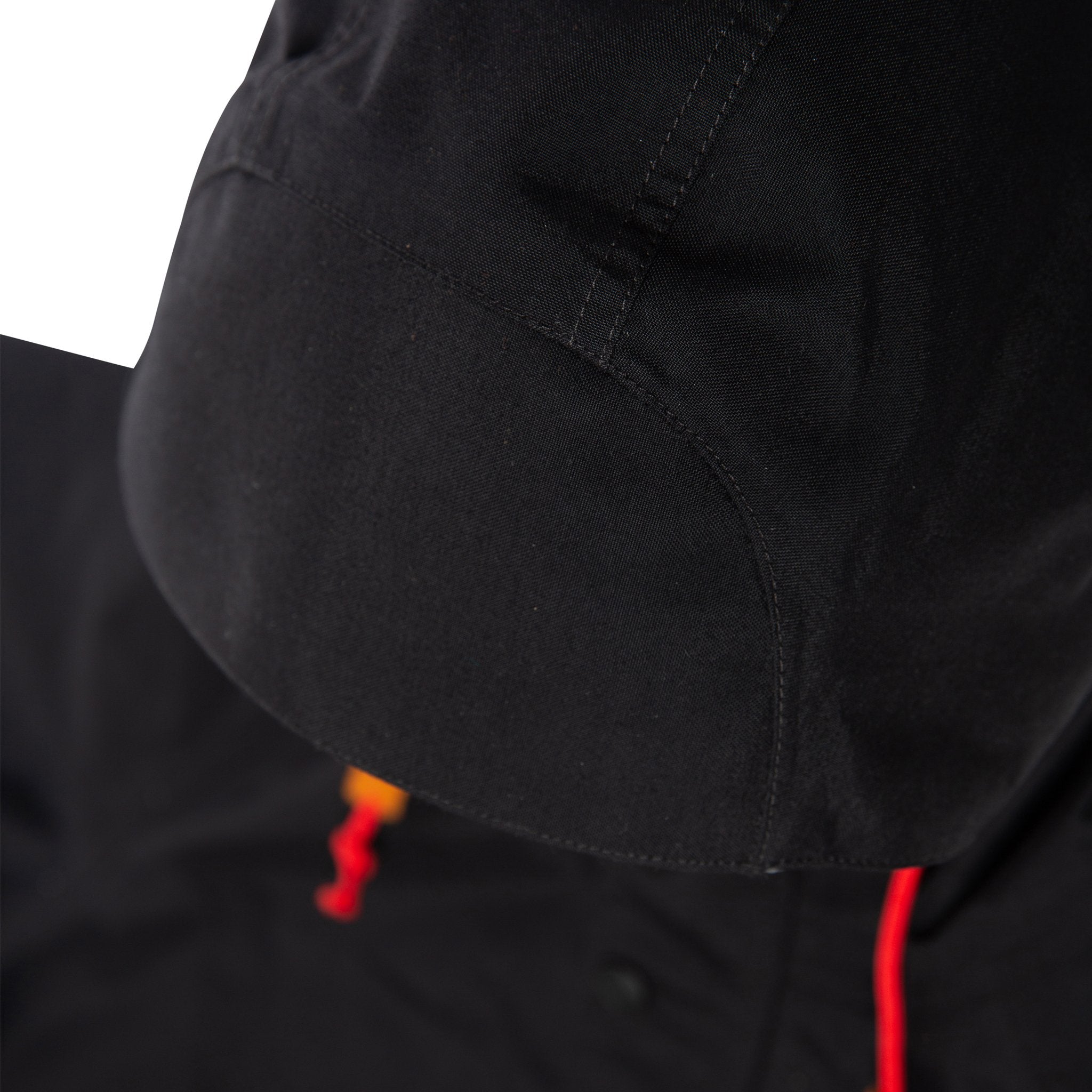 Detail product shot of women's tech trench 3L in black showing structured visor hood