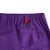 Detail shot of Topo Designs Women's Sport Skirt in Purple showing back key clip attachment point.