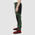 Side model shot of Topo Designs men's fleece pants in "forest / black"
