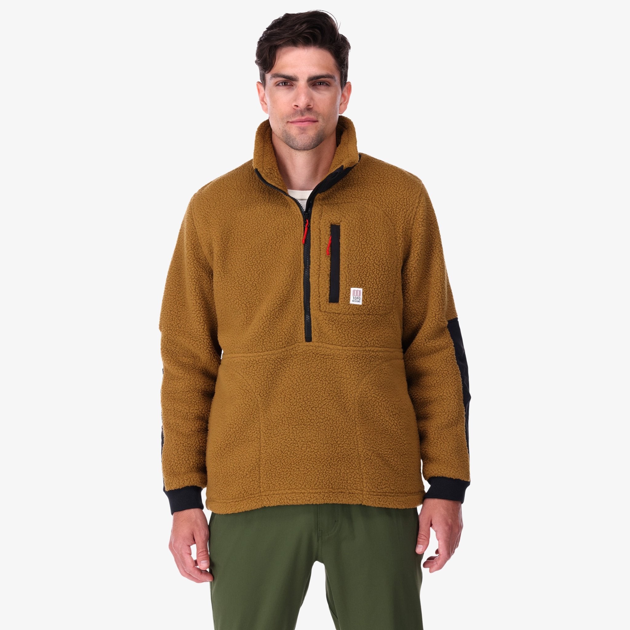 Topo Designs Men's Mountain Fleece Pullover in "dark khaki / black" brown on model.