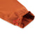 General shot of Topo Designs women's boulder pants in brick orange detail of drawstring on pant leg cuff.