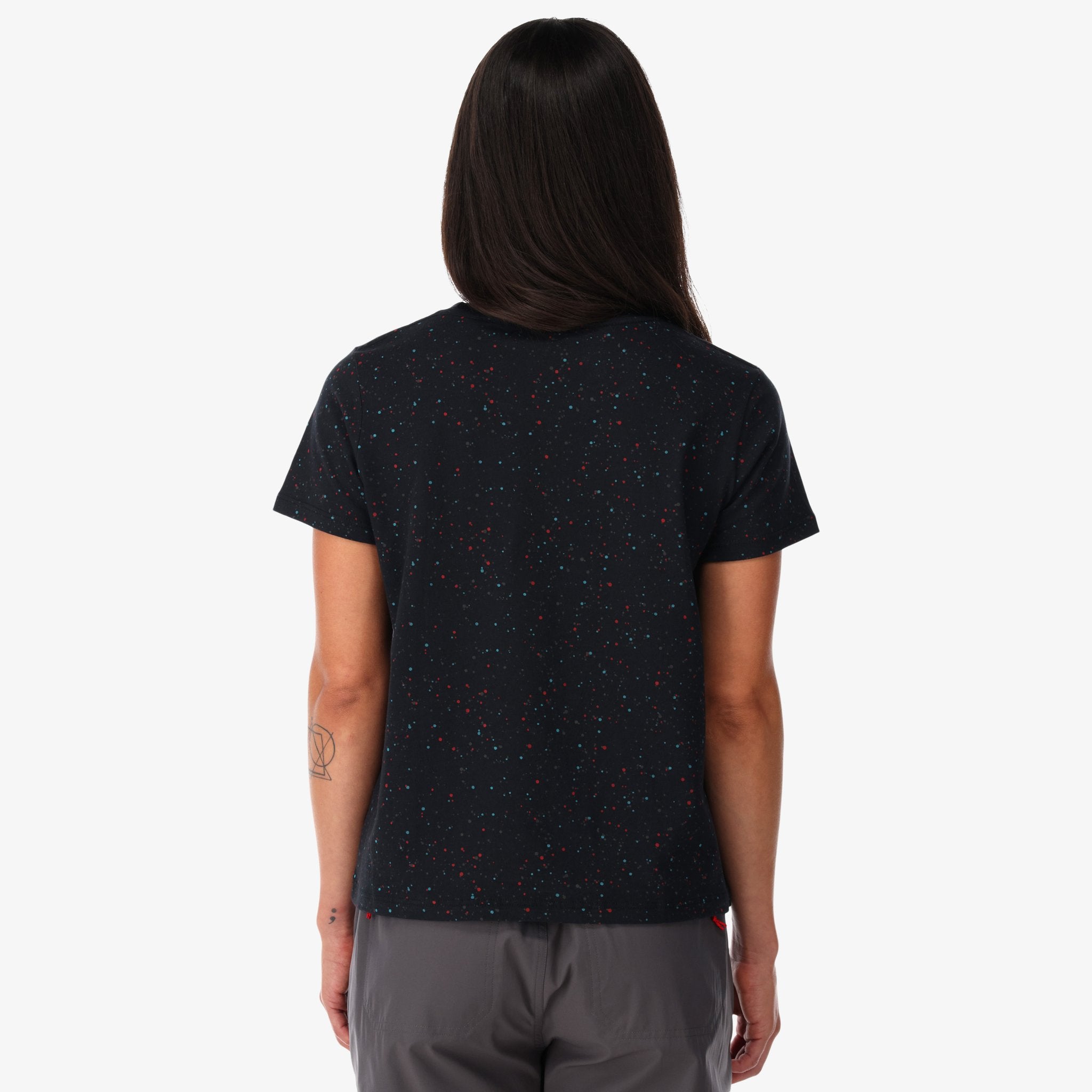 General back shot of Topo Designs Women's organic cotton Cosmos t-shirt in black on model.