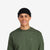 Front model shot of Topo Designs Global Beanie merino wool blend watchman cap in "black"