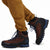 General detail shot of drawcord cinch on pant leg cuff of Topo Designs Men's Boulder lightweight climbing & hiking pants in "dark khaki" brown