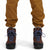 General detail shot of drawcord cinch on pant leg cuff of Topo Designs Men's Boulder lightweight climbing & hiking pants in "dark khaki" brown