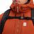General detail shot of hood cinch cords on Topo Designs Mountain Puffer Primaloft insulated Hoodie jacket in "Brick" orange