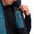 General front model shot of Topo Designs Men's Mountain Puffer recycled insulated Vest in "Pond Blue" showing interior chest pocket.