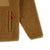 Detail shot of Topo Designs Men's Sherpa Jacket in "dark khaki" brown showing sherpa fleece sleeve and hand zipper pocket.