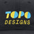 General detail shot of embroidered logo on Topo Designs Nylon Ball Cap Split Topo hat in "black"