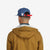 Back model shot of Topo Designs Nylon Ball Cap Split Topo embroidered logo hat in "pond blue"
