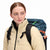 Front model shot of Topo Designs Women's Puffer recycled insulated Jacket in "Sand" white showing collar and zipper