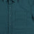 General shot of Topo Designs Men's Short Sleeve Dirt Shirt in pond blue showing close-up of buttons and check pocket.