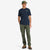 General shot of Topo Designs Men's Peaks & Valleys short sleeve 100% organic cotton graphic t-shirt in navy blue on model.