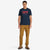 Topo Designs Men's Topo Fade Tee 100% organic cotton graphic logo short-sleeve t-shirt in navy blue on model.