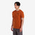 General shot On-model side view of Topo Designs Men's Cactus Landscape Tee 100% organic cotton graphic short sleeve t-shirt in "clay" orange.