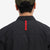General shot showing the back of the Topo Designs Men's Global Shirt Short Sleeve 30+ UPF rated travel shirt in Black.