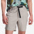 General on model front shot showing adjustable belt of the Topo Designs Men's River Shorts Lightweight quick dry swim trunks in "Light Gray" gray.