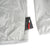 Front detail shot of side hand pocket of Topo Designs Ultralight Jacket - Lightweight Packable Travel Jacket for Women in Silver